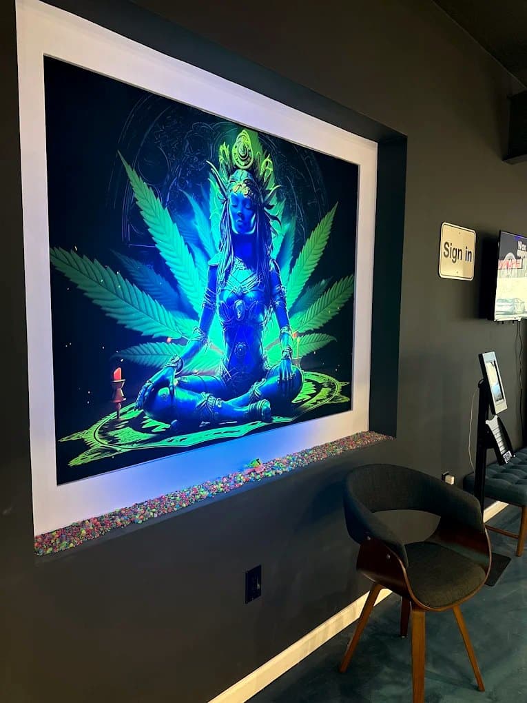 Blacklight goddess artwork inside Canna Buddha Jal